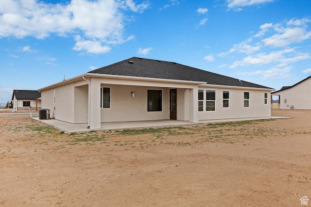 810 E 150 S, Enterprise, UT 84725 - rear view of house with central air condition unit, a patio, stucco siding, and a shingled roof