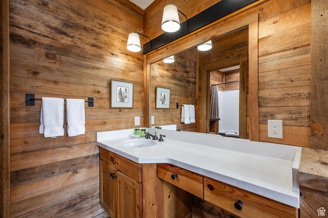8840 N The Unit 37, Sundance, UT 84604 - bathroom featuring wood walls and vanity