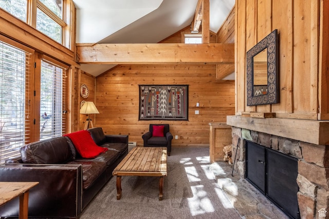 8840 N The Unit 37, Sundance, UT 84604 - carpeted living area with beam ceiling, high vaulted ceiling, wood walls, and a fireplace