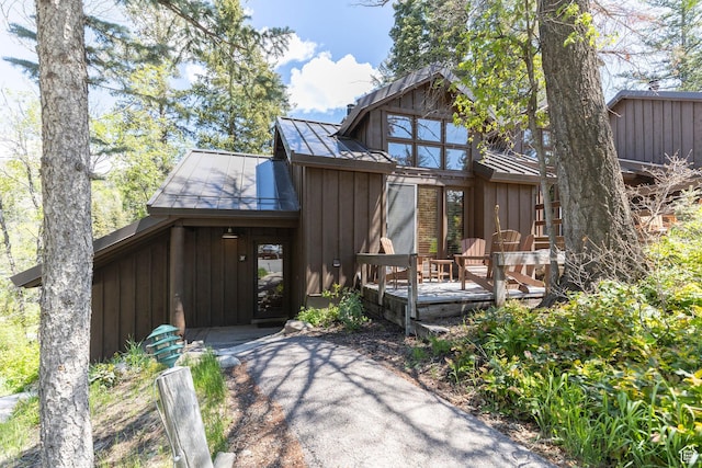 8840 N The Unit 37, Sundance, UT 84604 - view of front of home with board and batten siding, a deck, metal roof, and a standing seam roof