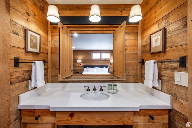 8840 N The Unit 37, Sundance, UT 84604 - bathroom featuring vanity and wooden walls