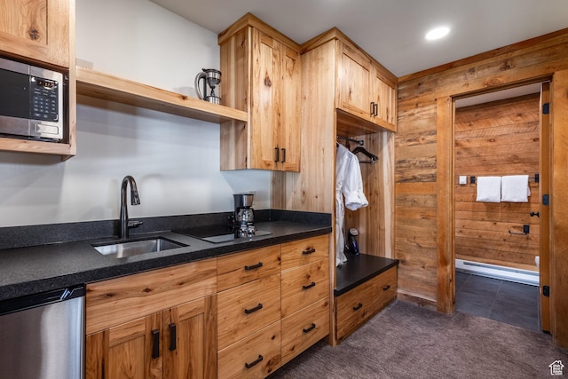8840 N The Unit 37, Sundance, UT 84604 - kitchen featuring open shelves, a sink, appliances with stainless steel finishes, a baseboard heating unit, and dark colored carpet