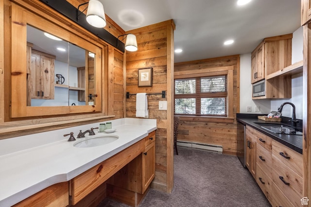 8840 N The Unit 37, Sundance, UT 84604 - bathroom featuring recessed lighting, baseboard heating, wood walls, and vanity