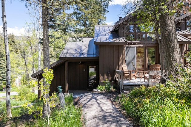 8840 N The Unit 37, Sundance, UT 84604 - view of front of home featuring board and batten siding, a wooden deck, metal roof, and a standing seam roof