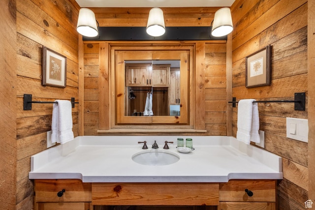 8840 N The Unit 37, Sundance, UT 84604 - bathroom featuring wood walls and vanity