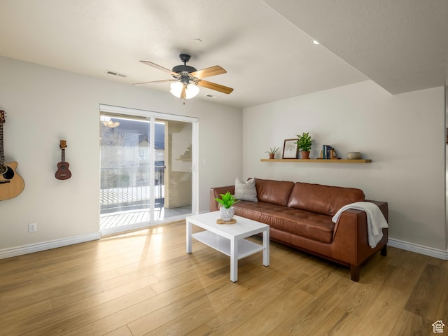 336 S 930 W Unit 203, Pleasant Grove, UT 84062 - living room with a ceiling fan, light wood-style flooring, baseboards, and visible vents