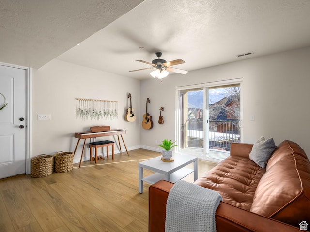 336 S 930 W Unit 203, Pleasant Grove, UT 84062 - living room featuring visible vents, a textured ceiling, ceiling fan, and light wood finished floors