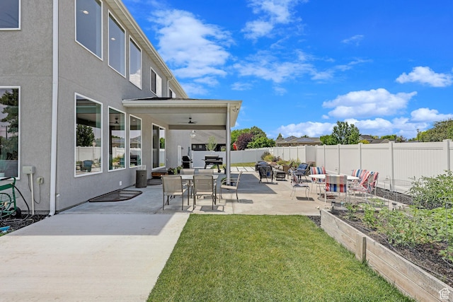exterior space with a fenced backyard, a patio, and a vegetable garden