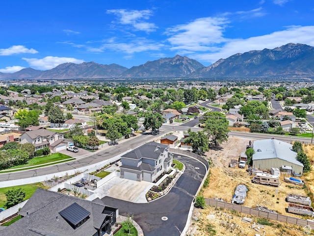 aerial view featuring a mountain view and a residential view