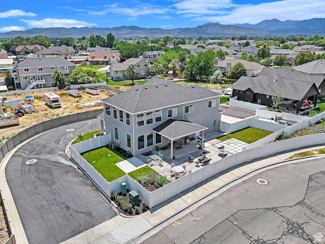 bird's eye view featuring a mountain view and a residential view