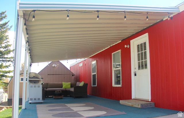 3223 S Nina Loop, Garden City, UT 84028 - view of patio / terrace with a carport and an outdoor hangout area