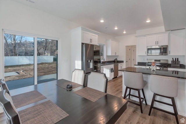 706 W 500 N, Brigham City, UT 84302 - dining area featuring recessed lighting and wood finished floors