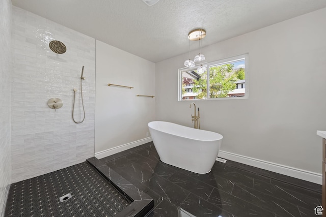 770 S 1680 E, Pleasant Grove, UT 84062 - bathroom with marble finish floor, baseboards, tiled shower, a textured ceiling, and a soaking tub