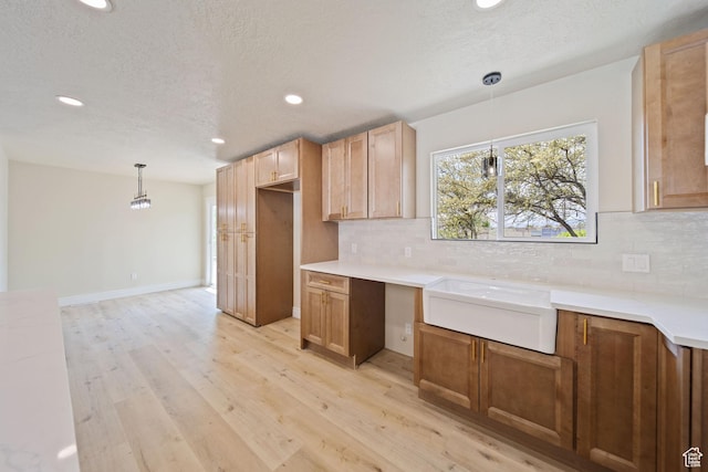 770 S 1680 E, Pleasant Grove, UT 84062 - kitchen featuring decorative backsplash, light wood finished floors, recessed lighting, and decorative light fixtures
