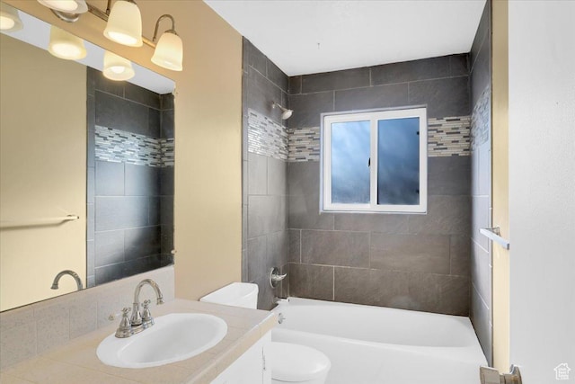 full bathroom featuring shower / bathtub combination, toilet, and vanity