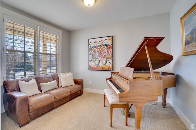living area with carpet flooring and baseboards