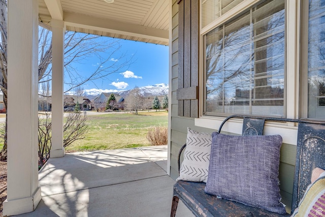 view of patio / terrace with a mountain view
