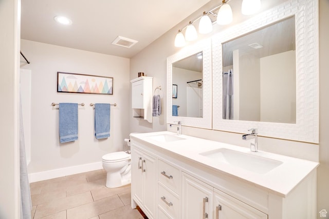 full bath with a sink, visible vents, toilet, and tile patterned flooring