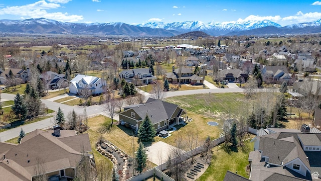 bird's eye view featuring a mountain view and a residential view