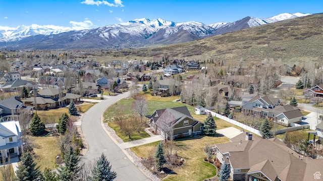 birds eye view of property with a residential view and a mountain view