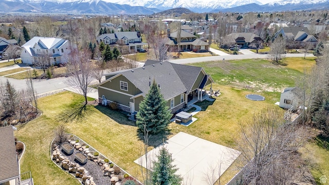 bird's eye view featuring a residential view and a mountain view