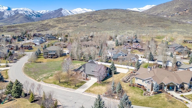 drone / aerial view with a mountain view and a residential view