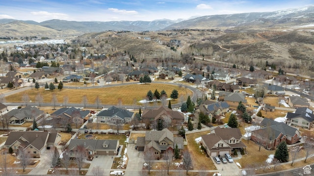 4048 W Ivy Ave, Mountain Green, UT 84050 - aerial view of property's location with nearby suburban area and a mountainous background