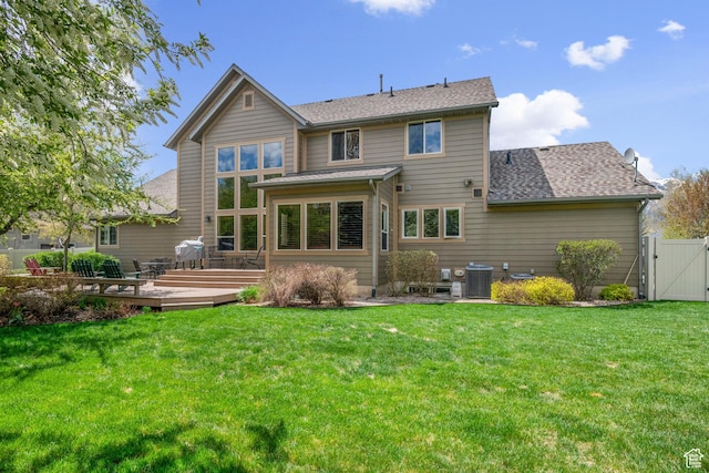 4048 W Ivy Ave, Mountain Green, UT 84050 - rear view of house with a wooden deck, central AC, a gate, and a shingled roof