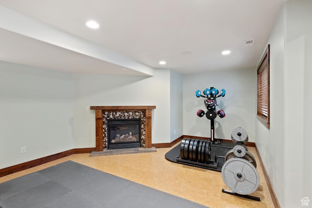 4048 W Ivy Ave, Mountain Green, UT 84050 - exercise area featuring recessed lighting, baseboards, and a fireplace