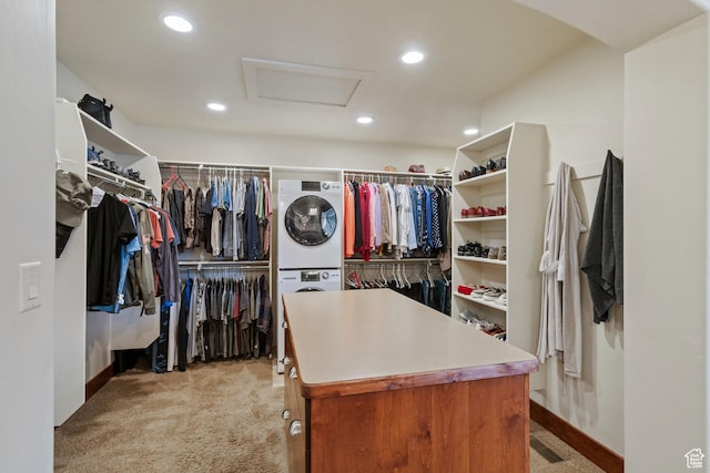 4048 W Ivy Ave, Mountain Green, UT 84050 - walk in closet featuring attic access, stacked washing machine and dryer, and light colored carpet