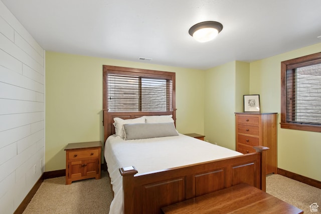 4048 W Ivy Ave, Mountain Green, UT 84050 - bedroom featuring baseboards and light colored carpet