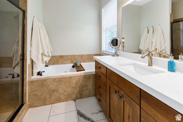 bathroom featuring vanity, a shower stall, and a bath