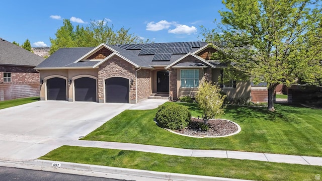 craftsman inspired home featuring stone siding, roof mounted solar panels, a garage, and concrete driveway