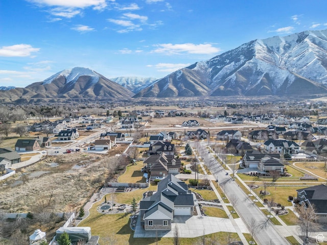 drone / aerial view featuring a mountain view and a residential view