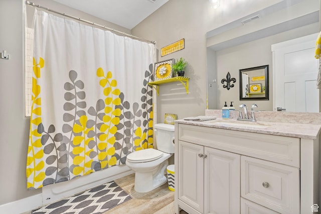 full bathroom with toilet, vanity, shower / bath combination with curtain, and visible vents