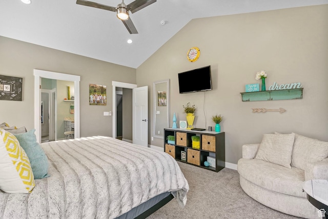 carpeted bedroom featuring baseboards, ensuite bath, a ceiling fan, and lofted ceiling