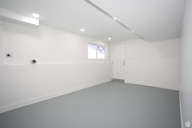 below grade area featuring recessed lighting and baseboards