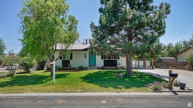 165 W 850 S, Heber City, UT 84032 - view of front facade with concrete driveway, a metal roof, and entry steps
