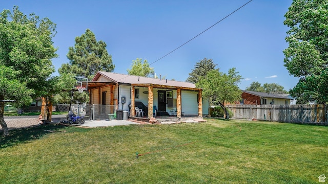 165 W 850 S, Heber City, UT 84032 - rear view of house with a fenced backyard, a patio area, and a metal roof