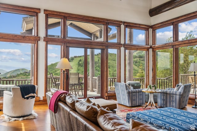 3438 Snow Top Ct, Park City, UT 84060 - living area featuring a high ceiling, a mountain view, and wood finished floors