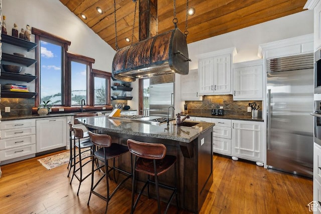 3438 Snow Top Ct, Park City, UT 84060 - kitchen with white cabinetry, wooden ceiling, tasteful backsplash, and appliances with stainless steel finishes