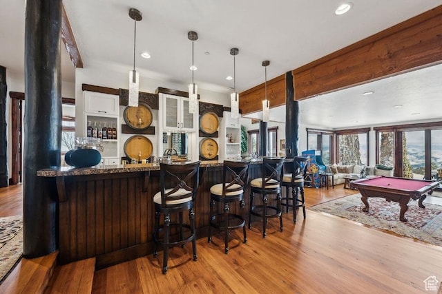 3438 Snow Top Ct, Park City, UT 84060 - kitchen featuring billiards, wood finished floors, recessed lighting, a kitchen breakfast bar, and decorative light fixtures