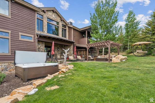 3438 Snow Top Ct, Park City, UT 84060 - rear view of house featuring stone siding, a hot tub, an outdoor living space, a pergola, and a patio