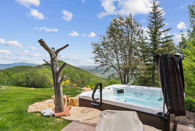3438 Snow Top Ct, Park City, UT 84060 - view of green lawn featuring a hot tub and a mountain view