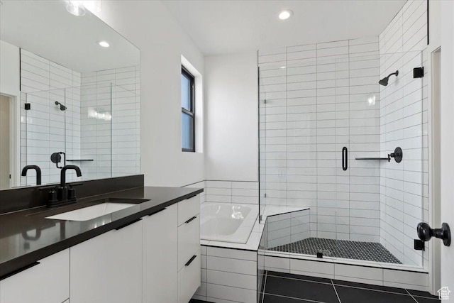 14404 S Champ Cv E Unit 144, Draper, UT 84020 - bathroom featuring vanity, a garden tub, recessed lighting, and a stall shower