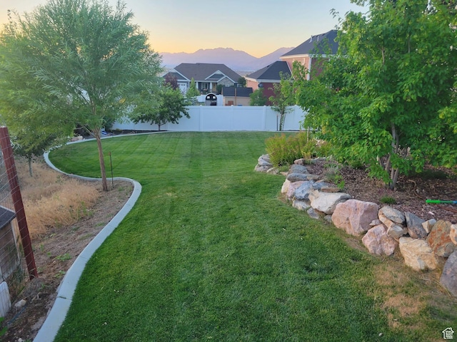 203 E Deer Run Loop Unit 40, Elk Ridge, UT 84651 - view of yard at dusk