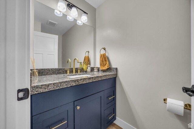 203 E Deer Run Loop Unit 40, Elk Ridge, UT 84651 - bathroom featuring vanity and baseboards
