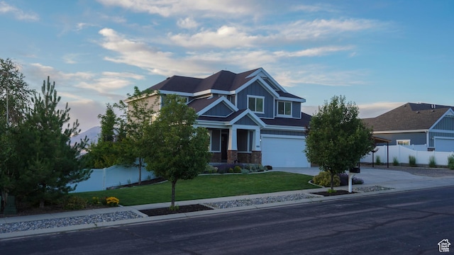 203 E Deer Run Loop Unit 40, Elk Ridge, UT 84651 - craftsman inspired home featuring a garage, concrete driveway, stone siding, and board and batten siding