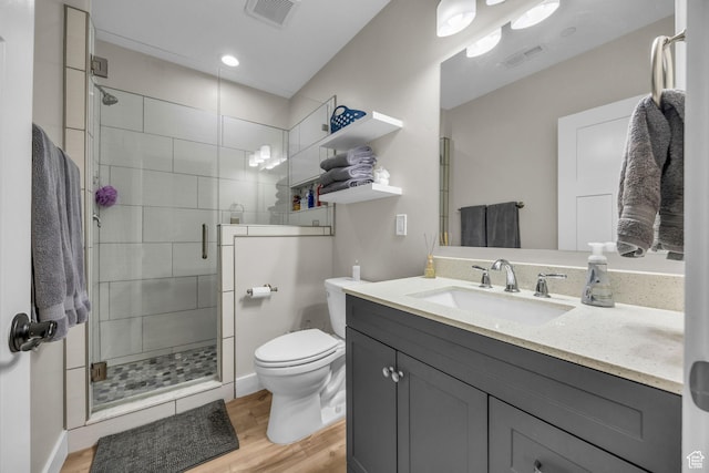 203 E Deer Run Loop Unit 40, Elk Ridge, UT 84651 - full bathroom featuring wood finished floors, a stall shower, toilet, vanity, and recessed lighting