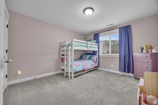 203 E Deer Run Loop Unit 40, Elk Ridge, UT 84651 - carpeted bedroom with baseboards and a textured ceiling